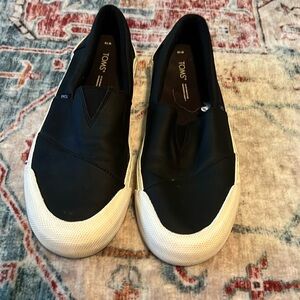Tom’s sneakers